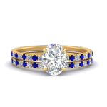 Load image into Gallery viewer, three-quarter-oval-shaped-diamond-gallery-bridal-ring-set-with-sapphire-in-FD9168OVGSABLANGLE3-NL-YG
