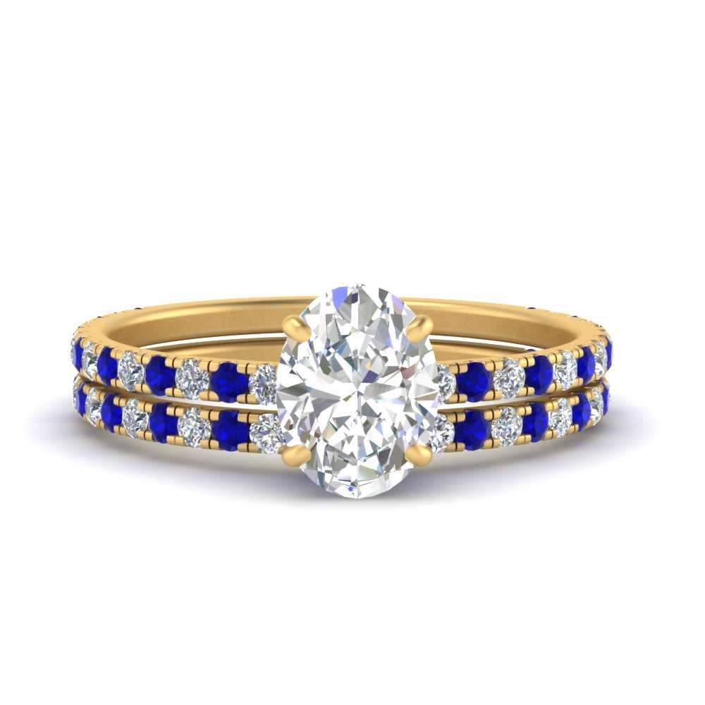 three-quarter-oval-shaped-diamond-gallery-bridal-ring-set-with-sapphire-in-FD9168OVGSABLANGLE3-NL-YG