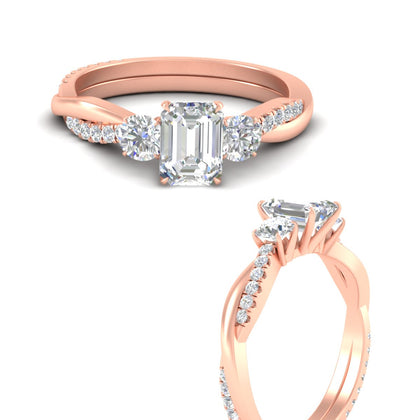 three-stone-emerald-shape-lab-ring-in-rose-gold-fdens3301emrangle3-nl-rg.jpg