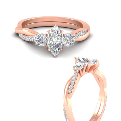 three-stone-marquise-engagement-ring-in-rose-gold-fdens3301mqrangle3-nl-rg.jpg