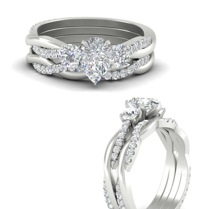 three-stone-pear-shape-engagement-ring-set-in-white-gold-fdens3301peangle3-nl-wg.jpg