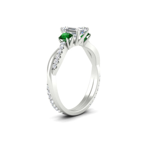 three-stone-twisted-emerald-cut-vine-emerald-engagement-ring-in-white-gold-fdens3301emrgemgrangle2-nl-wg.jpg