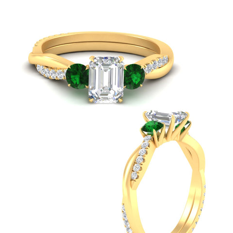 three-stone-twisted-emerald-cut-vine-emerald-engagement-ring-in-yellow-gold-fdens3301emrgemgrangle3-nl-yg.jpg