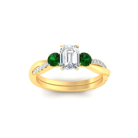three-stone-twisted-emerald-cut-vine-emerald-engagement-ring-in-yellow-gold-fdens3301emrgemgrangle5-nl-yg.jpg