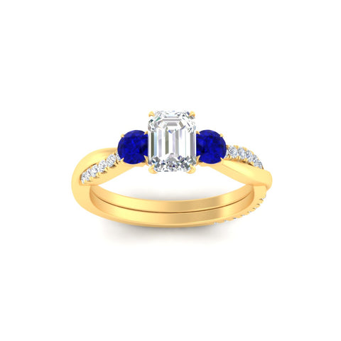 three-stone-twisted-emerald-cut-vine-sapphire-engagement-ring-in-yellow-gold-fdens3301emrgsablangle5-nl-yg.jpg