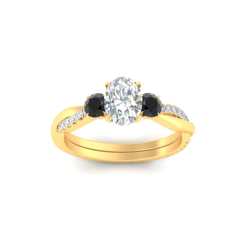 three-stone-twisted-oval-shaped-vine-black-diamond-engagement-ring-in-yellow-gold-fdens3301ovrgblackangle5-nl-yg.jpg