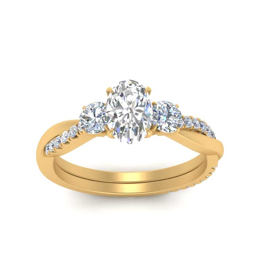 three-stone-twisted-oval-shaped-vine-diamond-ring-in-yellow-gold-FDENS3301OVR-NL-YG.jpg
