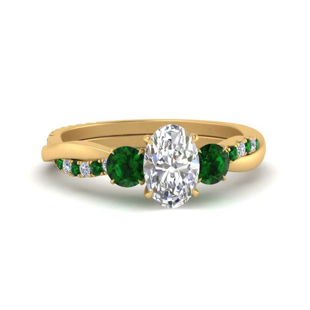 three-stone-twisted-oval-shaped-vine-diamond-ring-with-emerald-in-yellow-gold-FDENS3301OVRGEMGR-NL-YG.jpg