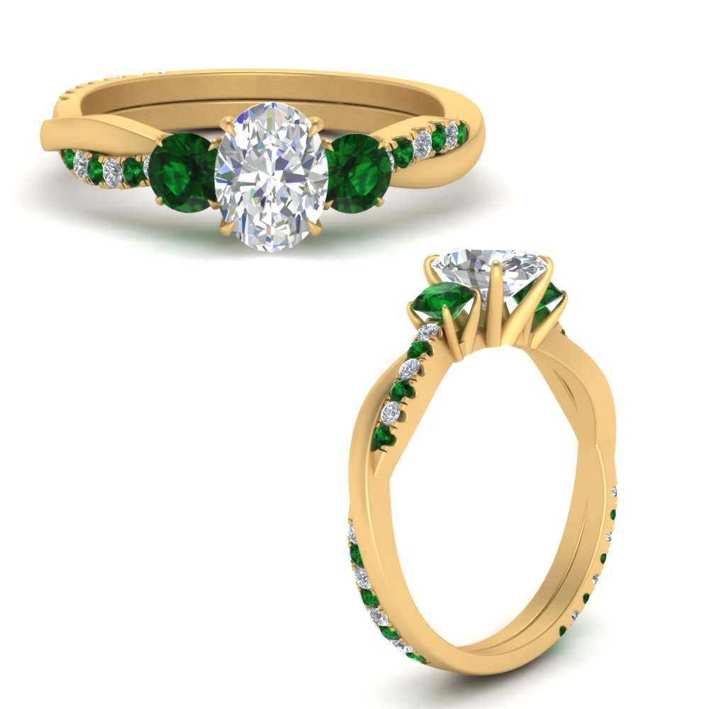 three-stone-twisted-oval-shaped-vine-diamond-ring-with-emerald-in-yellow-gold-FDENS3301OVRGEMGR-NL-YG.jpg