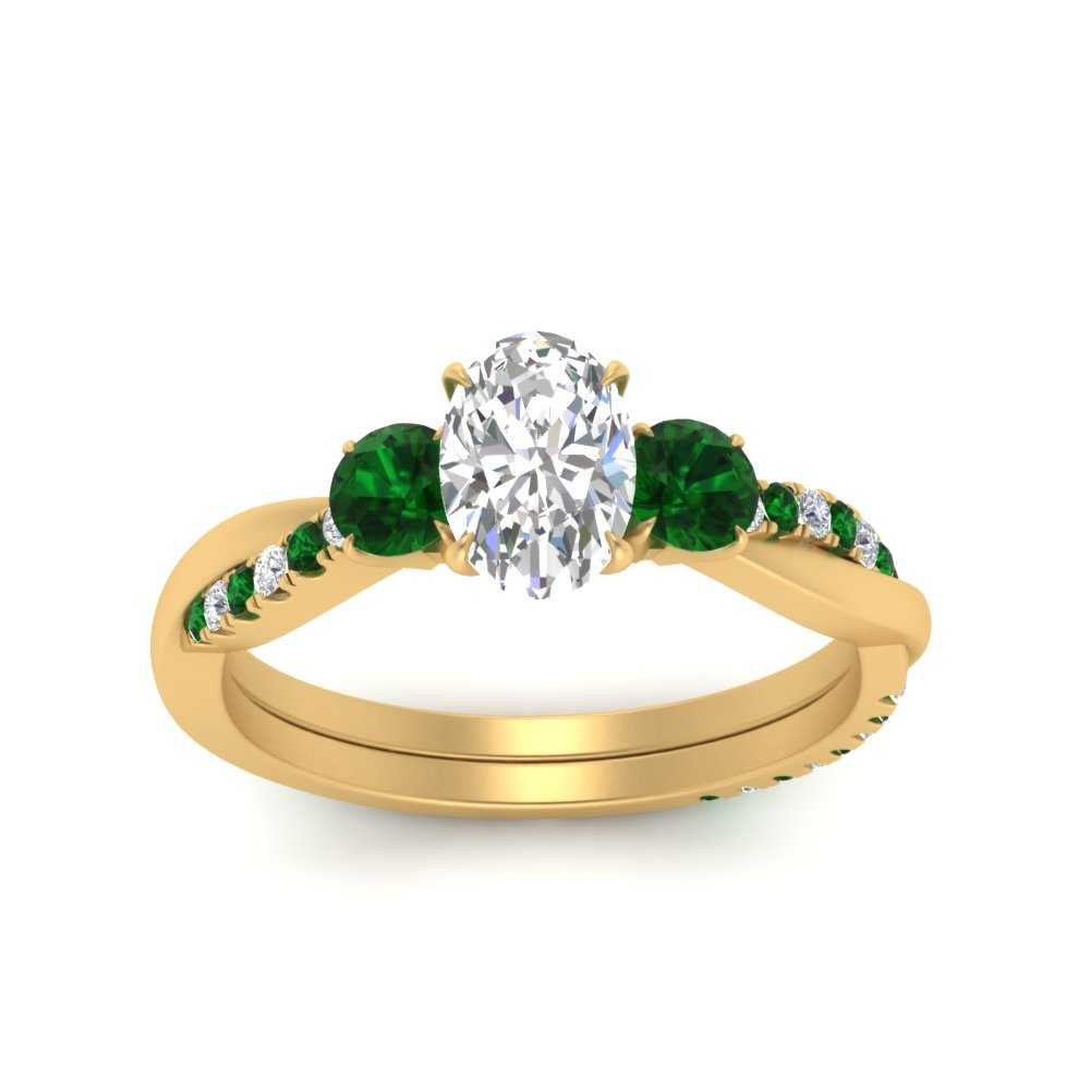 three-stone-twisted-oval-shaped-vine-diamond-ring-with-emerald-in-yellow-gold-FDENS3301OVRGEMGR-NL-YG.jpg