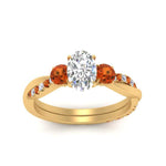 Load image into Gallery viewer, three-stone-twisted-oval-shaped-vine-diamond-ring-with-orange-sapphire-in-yellow-gold-FDENS3301OVRGSAOR-NL-YG.jpg
