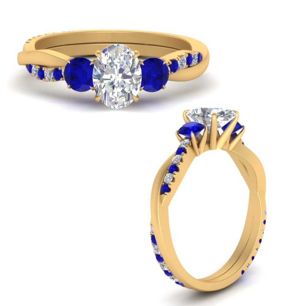 three-stone-twisted-oval-shaped-vine-diamond-ring-with-sapphire-in-yellow-gold-FDENS3301OVRGSABL-NL-YG.jpg