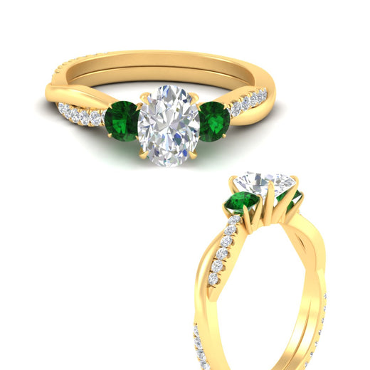 three-stone-twisted-oval-shaped-vine-emerald-engagement-ring-in-yellow-gold-fdens3301ovrgemgrangle3-nl-yg.jpg