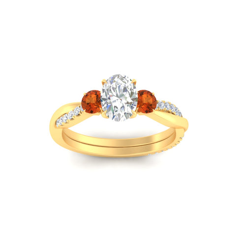 three-stone-twisted-oval-shaped-vine-orange-sapphire-engagement-ring-in-yellow-gold-fdens3301ovrgsaorangle5-nl-yg.jpg