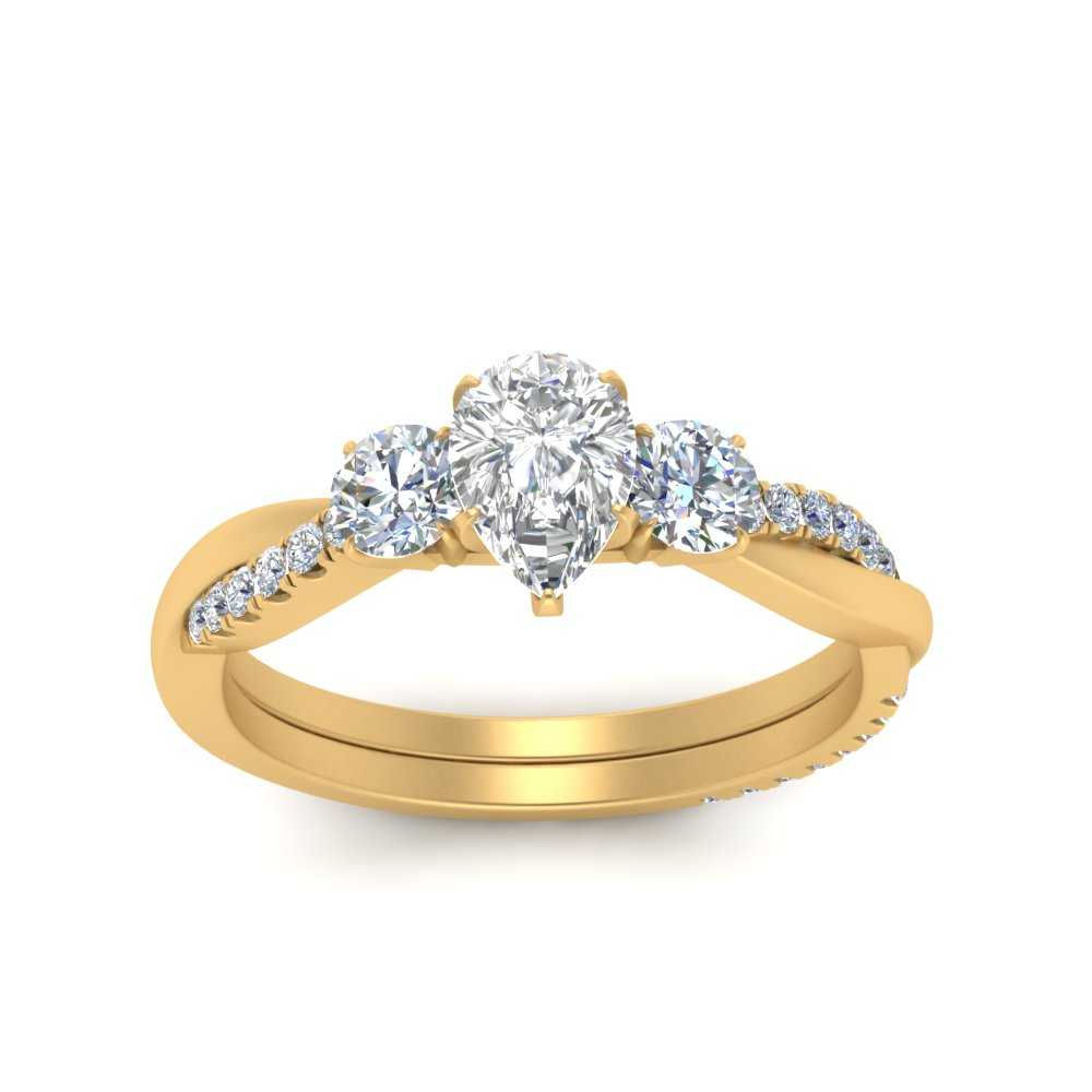 three-stone-twisted-pear-shaped-vine-diamond-ring-in-yellow-gold-FDENS3301PER-NL-YG.jpg