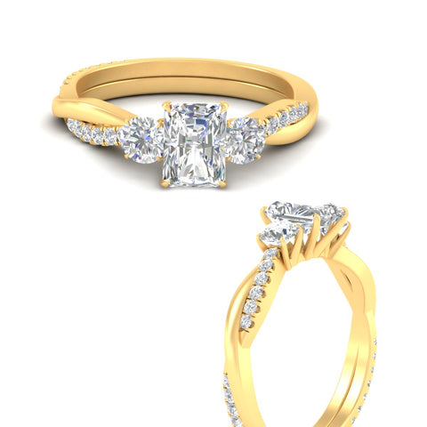 three-stone-twisted-radiant-cut-vine-diamond-engagement-ring-in-yellow-gold-fdens3301rarangle3-nl-yg.jpg