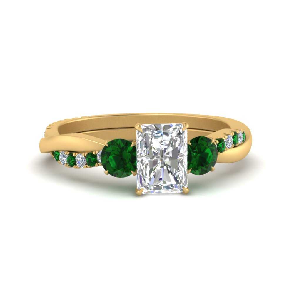 three-stone-twisted-radiant-cut-vine-diamond-ring-with-emerald-in-yellow-gold-FDENS3301RARGEMGR-NL-YG.jpg