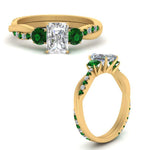 Load image into Gallery viewer, three-stone-twisted-radiant-cut-vine-diamond-ring-with-emerald-in-yellow-gold-FDENS3301RARGEMGR-NL-YG.jpg
