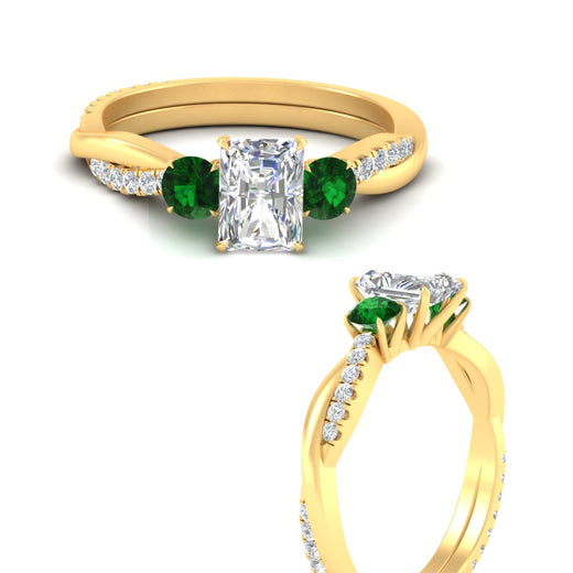 three-stone-twisted-radiant-cut-vine-emerald-engagement-ring-in-yellow-gold-fdens3301rargemgrangle3-nl-yg.jpg