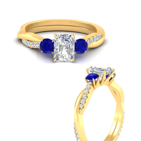 three-stone-twisted-radiant-cut-vine-sapphire-engagement-ring-in-yellow-gold-fdens3301rargsablangle3-nl-yg.jpg
