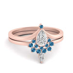 Load image into Gallery viewer, tiara-pear-bezel-blue-topaz-wedding-ring-set-in-rose-gold-FD1046PEGICBLTO-NL-RG_fbc55068-566f-414f-88b1-0d218c3d43fb?v=1761911441
