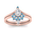 Thumbnail 31 - tiara-pear-bezel-blue-topaz-wedding-ring-set-in-rose-gold-FD1046PEGICBLTOANGLE5-NL-RG?v=1761911422