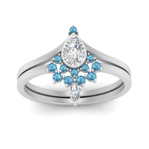 tiara-pear-bezel-blue-topaz-wedding-ring-set-in-white-gold-FD1046PEGICBLTOANGLE5-NL-WG?v=1761911422