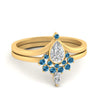 Load image into Gallery viewer, tiara-pear-bezel-blue-topaz-wedding-ring-set-in-yellow-gold-FD1046PEGICBLTO-NL-YG?v=1761911422