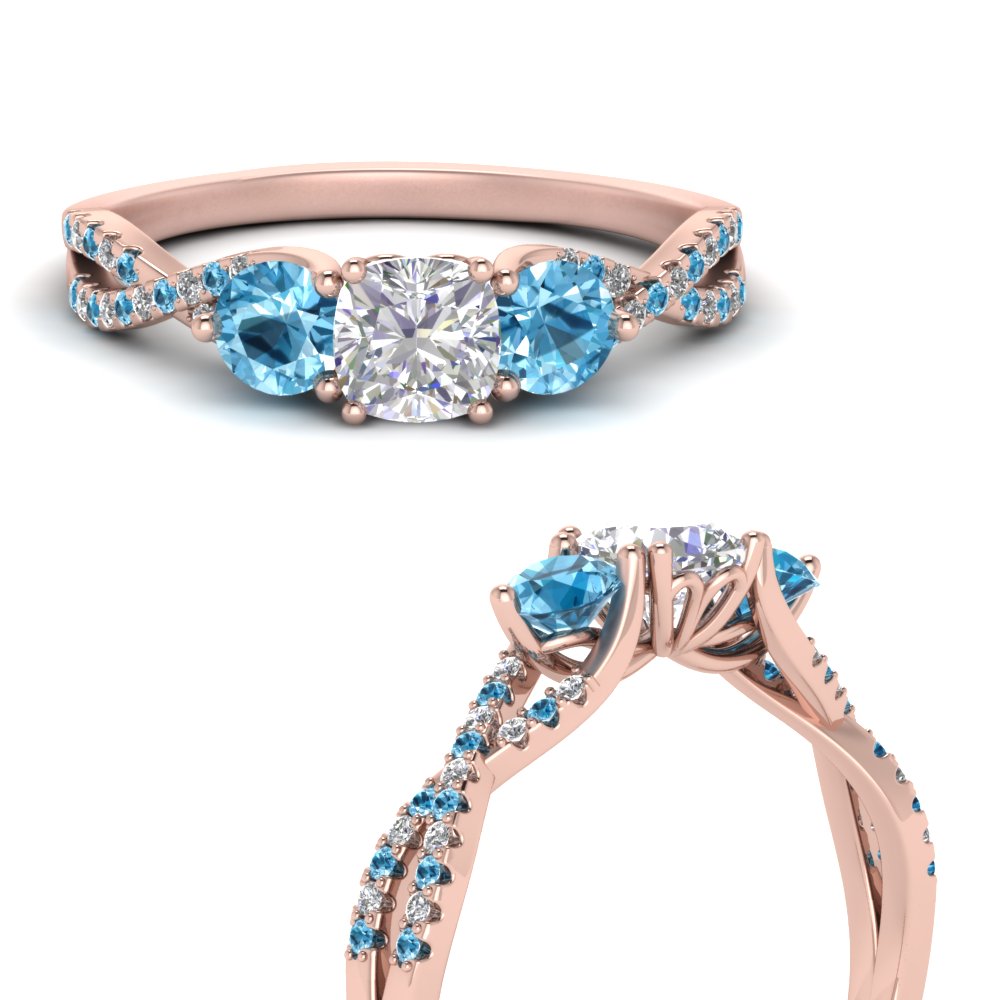 trellis-twisted-3-stone-cushion-cut-diamond-ring-blue-topaz-in-rose-gold-FD123699CURGICBLTOANGLE3-NL-RG_69084217-4ce2-4128-b476-3f61a0ad36a0?v=1756181824