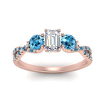 Load image into Gallery viewer, trellis-twisted-3-stone-emerald-cut-diamond-ring-blue-topaz-in-rose-gold-FD123699EMRGICBLTOANGLE5-NL-RG_988e67a5-3f7f-452c-bb49-62238a997c0c?v=1756181838
