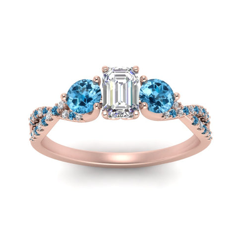 trellis-twisted-3-stone-emerald-cut-diamond-ring-blue-topaz-in-rose-gold-FD123699EMRGICBLTOANGLE5-NL-RG_988e67a5-3f7f-452c-bb49-62238a997c0c?v=1756181838