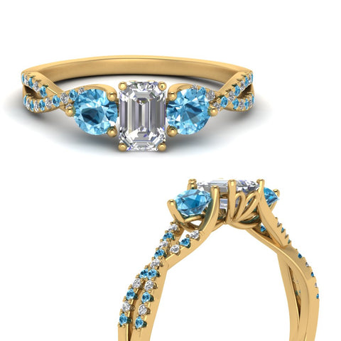 trellis-twisted-3-stone-emerald-cut-diamond-ring-blue-topaz-in-yellow-gold-FD123699EMRGICBLTOANGLE3-NL-YG?v=1756181639