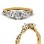 Load image into Gallery viewer, trellis-twisted-3-stone-emerald-cut-diamond-ring-in-yellow-gold-FD123699EMRANGLE3-NL-YG_005d6c0f-ca40-4010-8ec7-ddc08f3b2def?v=1756181838
