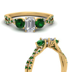 Load image into Gallery viewer, trellis-twisted-3-stone-emerald-cut-diamond-ring-with-emerald-in-yellow-gold-FD123699EMRGEMGRANGLE3-NL-YG?v=1756181639
