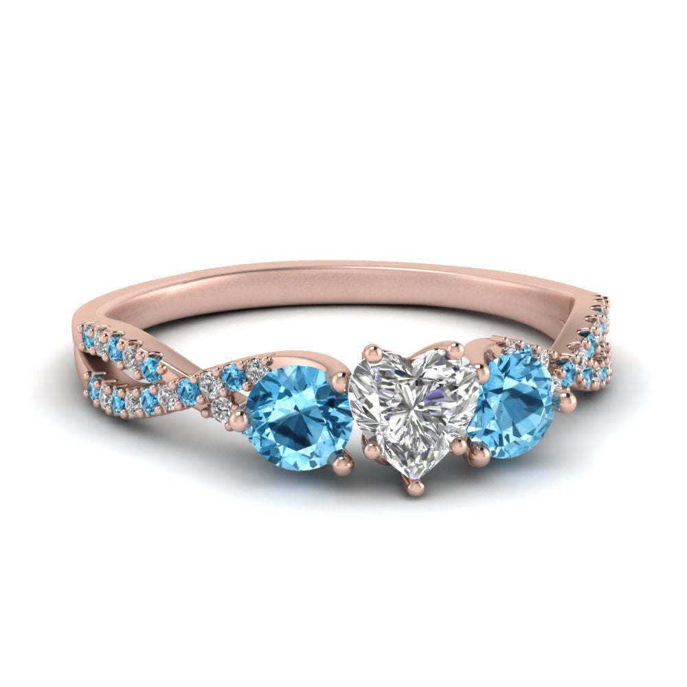 trellis-twisted-3-stone-heart-shaped-diamond-ring-blue-topaz-in-rose-gold-FD123699HTRGICBLTO-NL-RG_6272f635-82da-4fc1-bbec-918b1c38959b?v=1756181852