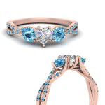 Load image into Gallery viewer, trellis-twisted-3-stone-heart-shaped-diamond-ring-blue-topaz-in-rose-gold-FD123699HTRGICBLTOANGLE3-NL-RG?v=1756181662
