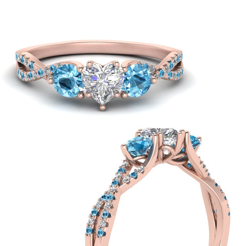 trellis-twisted-3-stone-heart-shaped-diamond-ring-blue-topaz-in-rose-gold-FD123699HTRGICBLTOANGLE3-NL-RG?v=1756181662