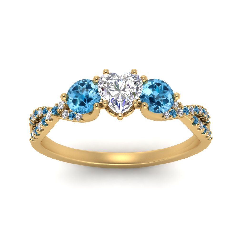 trellis-twisted-3-stone-heart-shaped-diamond-ring-blue-topaz-in-yellow-gold-FD123699HTRGICBLTOANGLE5-NL-YG?v=1756181662