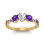 Load image into Gallery viewer, trellis-twisted-3-stone-heart-shaped-diamond-ring-violet-topaz-in-yellow-gold-FD123699HTRGVITOANGLE5-NL-YG_bf7b6e27-ebaa-448b-884b-e3fb1102ebcc?v=1756181851
