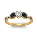 Load image into Gallery viewer, trellis-twisted-3-stone-heart-shaped-diamond-ring-with-black-diamond-in-yellow-gold-FD123699HTRGBLACKANGLE5-NL-YG?v=1756181662

