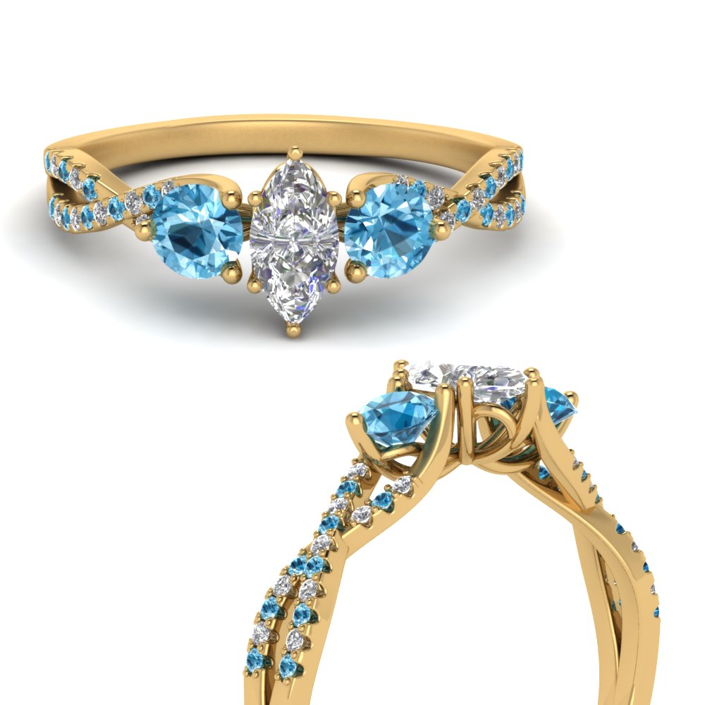 trellis-twisted-3-stone-marquise-cut-diamond-ring-blue-topaz-in-yellow-gold-FD123699MQRGICBLTOANGLE3-NL-YG_9315f664-aa56-45c3-a036-328449949530?v=1756181864