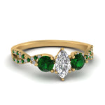 Load image into Gallery viewer, trellis-twisted-3-stone-marquise-cut-diamond-ring-with-emerald-in-yellow-gold-FD123699MQRGEMGR-NL-YG_9a45b50b-d62f-46c8-a22e-41cc85e8f65a?v=1756181863
