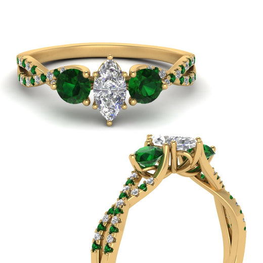 trellis-twisted-3-stone-marquise-cut-diamond-ring-with-emerald-in-yellow-gold-FD123699MQRGEMGRANGLE3-NL-YG_0555cd55-7663-4f44-a75b-dbcc4f6c56b9?v=1756181863