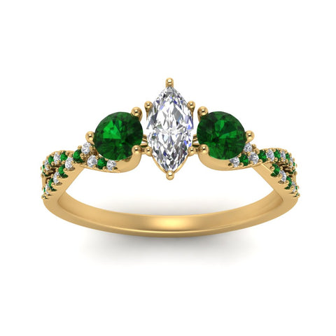 trellis-twisted-3-stone-marquise-cut-diamond-ring-with-emerald-in-yellow-gold-FD123699MQRGEMGRANGLE5-NL-YG_60853911-a6c8-4cb2-a12f-65d5c7c56671?v=1756181863