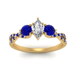 Load image into Gallery viewer, trellis-twisted-3-stone-marquise-cut-diamond-ring-with-sapphire-in-yellow-gold-FD123699MQRGSABLANGLE5-NL-YG_7ae21d3f-9556-4677-bf76-15271f8f0df2?v=1756181864
