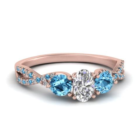 trellis-twisted-3-stone-oval-shaped-diamond-ring-blue-topaz-in-rose-gold-FD123699OVRGICBLTO-NL-RG?v=1756181706
