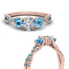Load image into Gallery viewer, trellis-twisted-3-stone-oval-shaped-diamond-ring-blue-topaz-in-rose-gold-FD123699OVRGICBLTOANGLE3-NL-RG_71a04a0c-4dee-4c6c-813d-5eee0b964749?v=1756181877