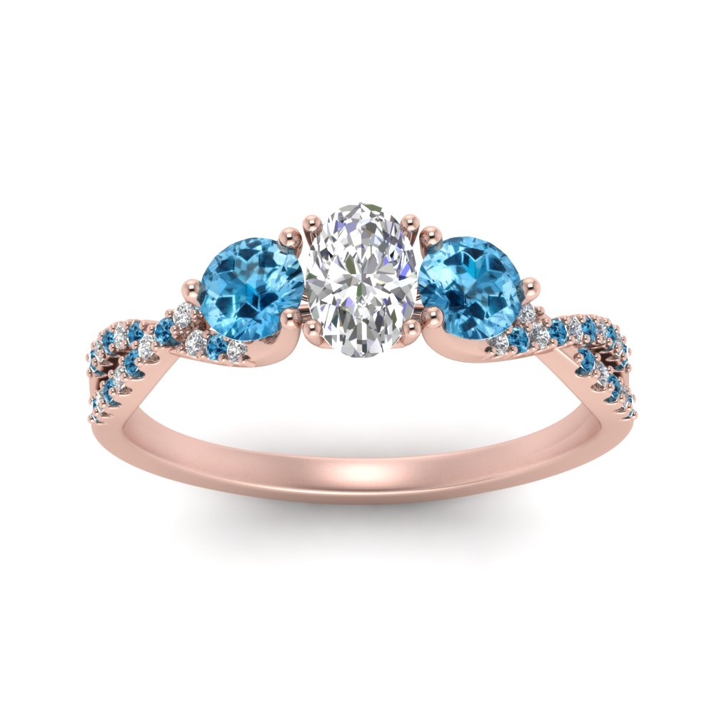 trellis-twisted-3-stone-oval-shaped-diamond-ring-blue-topaz-in-rose-gold-FD123699OVRGICBLTOANGLE5-NL-RG?v=1756181706