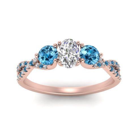 trellis-twisted-3-stone-oval-shaped-diamond-ring-blue-topaz-in-rose-gold-FD123699OVRGICBLTOANGLE5-NL-RG_839c84e2-ef72-4e71-95d3-dae9347c02b9?v=1756181878
