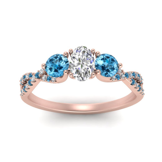 trellis-twisted-3-stone-oval-shaped-diamond-ring-blue-topaz-in-rose-gold-FD123699OVRGICBLTOANGLE5-NL-RG_839c84e2-ef72-4e71-95d3-dae9347c02b9?v=1756181878